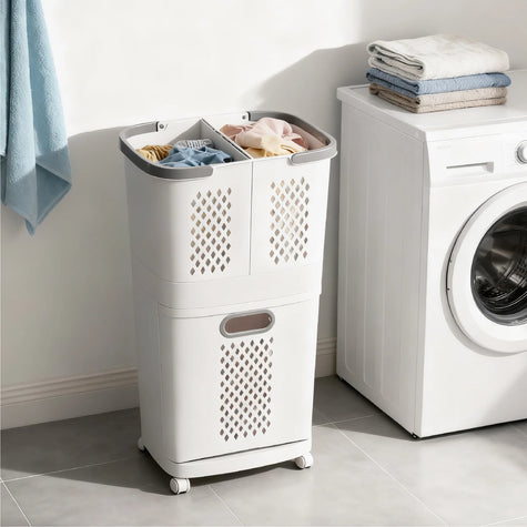 Two multi-tier laundry baskets with shelves on top, one with two baskets and one with three, against a green background.