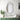 Irregular black-framed wall mirror above a vanity with drawers, featuring potted plants and toiletries on the countertop